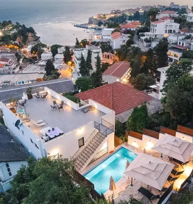 an aerial view of a house with a swimming pool at Casa Bianca & Spa in Ulcinj