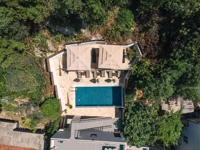 an overhead view of a house with a swimming pool at Casa Bianca & Spa in Ulcinj