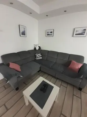 a living room with a couch and a table at Apartment Tijana in Bar