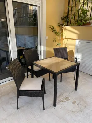 a table and chairs sitting on a patio at Villa Casanego in Sutomore