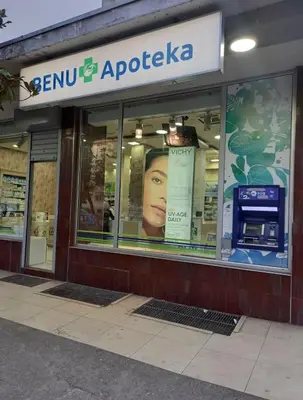 a store front of a store with a sign on the window at Apartment Podgorica centre in Podgorica