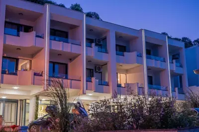 a large apartment building with a lot of balconies at Sea Star Apartments in Ulcinj