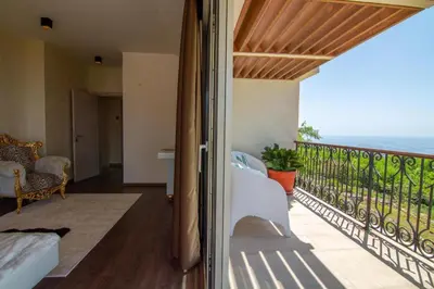 a balcony with a view of the ocean at Luxury Villa Crystal Blue in Sveti Stefan