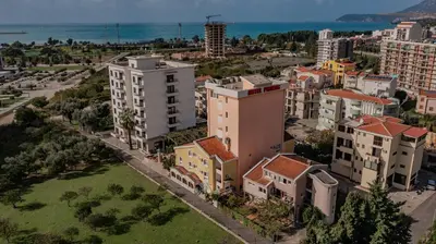 an aerial view of a city with buildings at Hotel Pharos in Bar