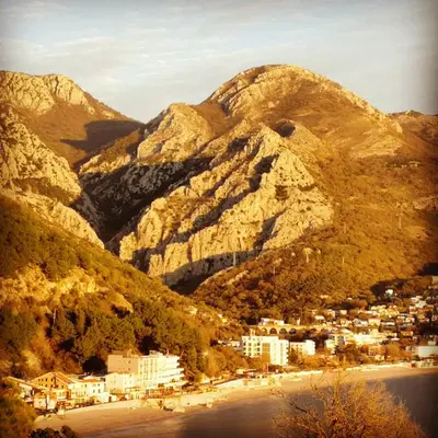 a town in front of a mountain range at Villa Marko in Sutomore