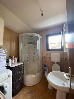 a bathroom with a shower and a sink at Apartman L&M in Cetinje