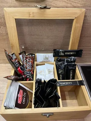a wooden box filled with different types of food at Apartments 28 in Podgorica