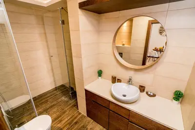 a bathroom with a sink and a mirror at Apartments Magic Sea View in Kotor