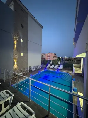 a swimming pool on top of a building at Etna Apartments in Ulcinj