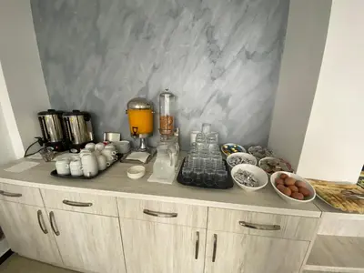 a counter with a blender on top of a cabinet at Etna Apartments in Ulcinj