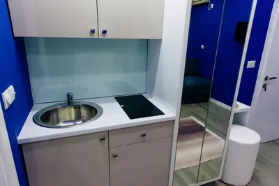 a bathroom with a sink and a mirror at Etna Apartments in Ulcinj