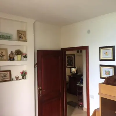 a room with a door and a room with a room with at Apartment Botanicheskiy Sad in Sutomore