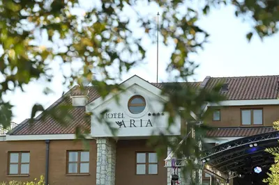 a building with a sign that reads hotel xaria at Hotel Aria in Podgorica