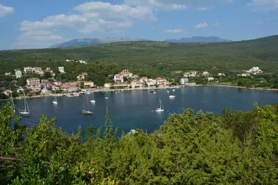 a view of a harbor with boats in the water at Apartments Bigovo Veljic in Tivat