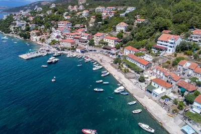 an aerial view of a town with boats in the water at Apartments Vesna in Tivat