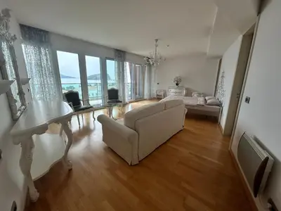 a living room with a couch and a table at Apartments Krug in Budva