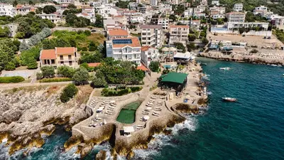 an aerial view of a resort near the water at Hotel R in Utjeha