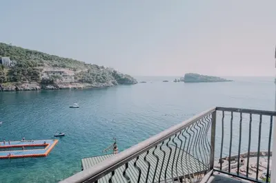 a view of a body of water from a balcony at Hotel R in Utjeha