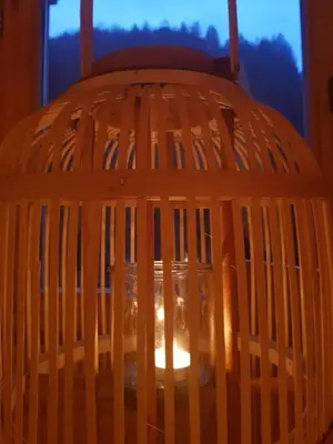 a wooden bird cage with a light in it at Brvnara Borovik in Cetinje