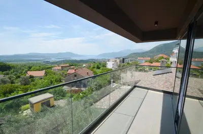 a view from the balcony of a house at Royal Olive Residence in Kotor