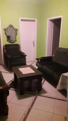 a living room with a couch and a coffee table at Apartment Dragone in Ulcinj