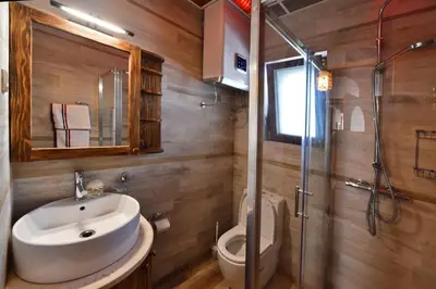 a bathroom with a sink and a toilet at Villa Dub in Kotor