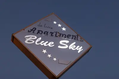 a sign for an appointment blue sky at Blue Sky Apartments-Ulcinj, Montenegro in Ulcinj