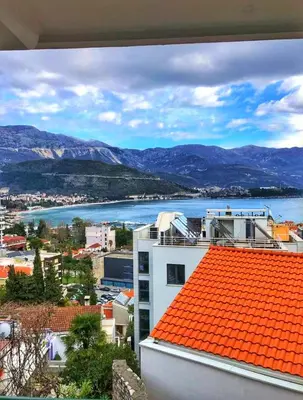a view of a city with an orange roof at Apartmani Cupic in Budva