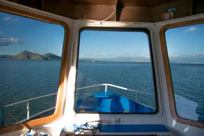 a view from the front of a boat on the water at Skadar lake Apartments Pajovic in Virpazar