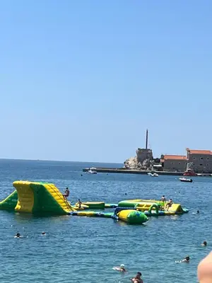 a group of inflatable boats in the water at Apartment Dijana in Petrovac na Moru