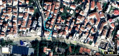 a map of a city with houses and a bridge at Vojinovic Apartments in Budva