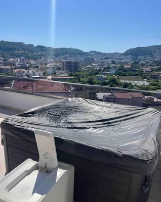 a toilet on a roof with a tarp on it at Demiri Rr in Ulcinj