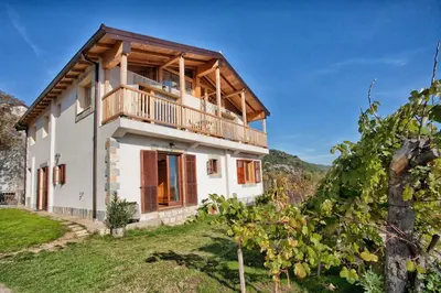 an image of a house with a balcony at Accommodation 
