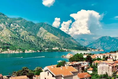 a view of a city and a lake with mountains at Dream Bay View Loki in Kotor