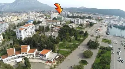 a kite flying in the air over a city at Апартаменты Ирина М in Bar