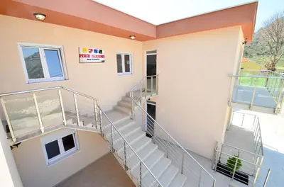 arial view of a building with stairs on it at Four Seasons Apartments in Kotor