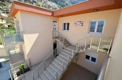 an overhead view of a building with stairs and windows at Four Seasons Apartments in Kotor