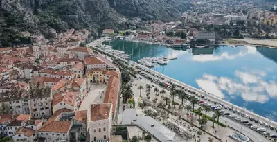 an aerial view of a town next to a river at Four Seasons Apartments in Kotor