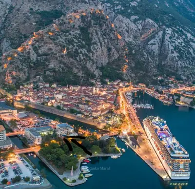 an aerial view of a city with a harbor at Magnolia Old Town in Kotor