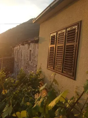 an open window on the side of a building at Apartman 