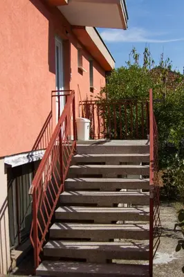 a set of stairs leading to a house at Apartment Lazar & Marco in Podgorica