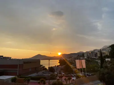 a view of the sunset from our apartment at Apartmani Kažanegra33 in Pržno
