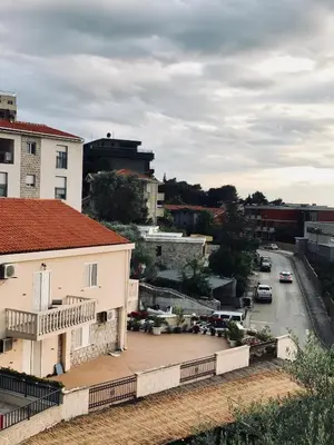 a view of a city with a building and a street at Apartmani Kažanegra33 in Pržno