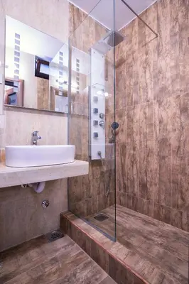 a bathroom with a sink and a shower at Luxury Boutique Studio Apartments in Budva