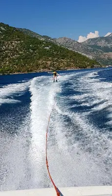 a person water skiing in a body of water at Villa Rolla in Tivat