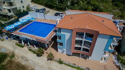 an overhead view of a house with a swimming pool at Apartments De Lara in Utjeha