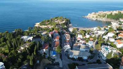 an aerial view of a small town next to the ocean at Adriatic Apartments in Ulcinj