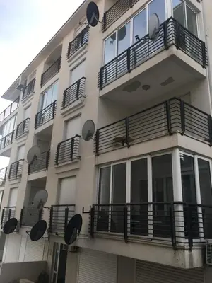 a building with balconies on the side of it at Impuls 2 in Budva