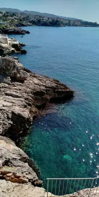 a view of the ocean from a rocky cliff at Your Home Montenegro in Dobra Voda