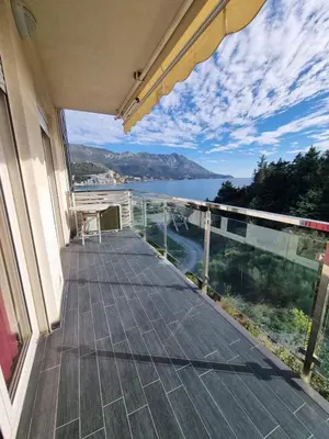 a balcony of a house with a view of the water at Bečiči -Big apartments in Becici
